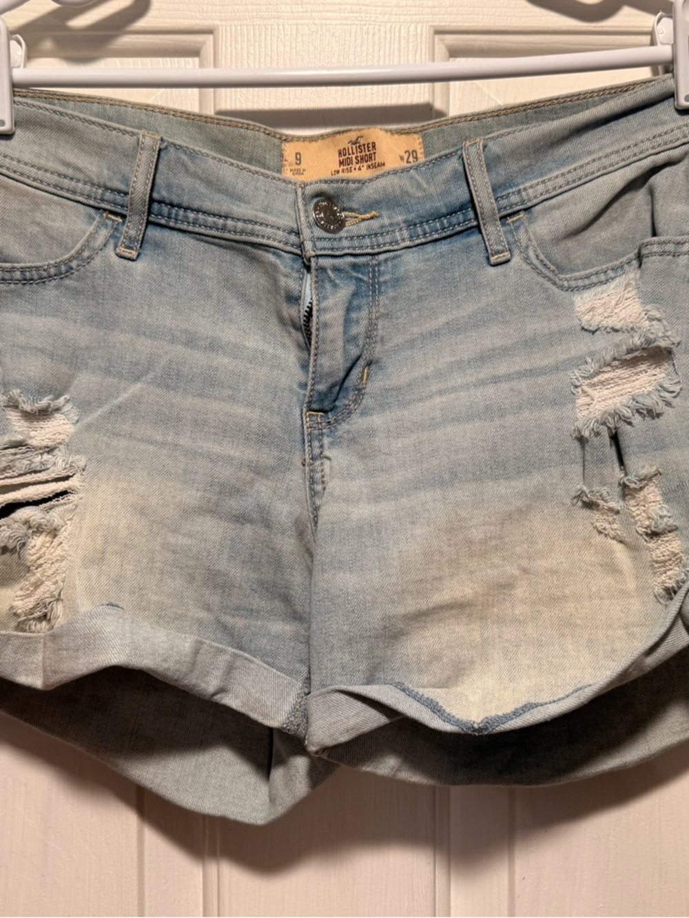 Hollister Faded Light Blue Distressed Denim Mid-Rise Shorts